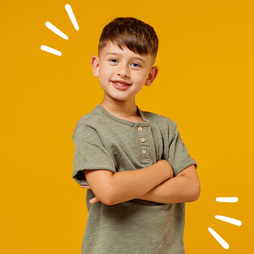 young boy with green tee on